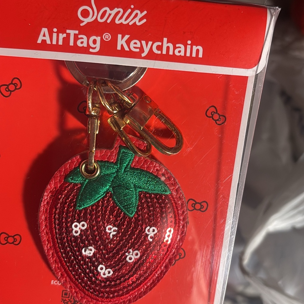Like new strawberry airtag case